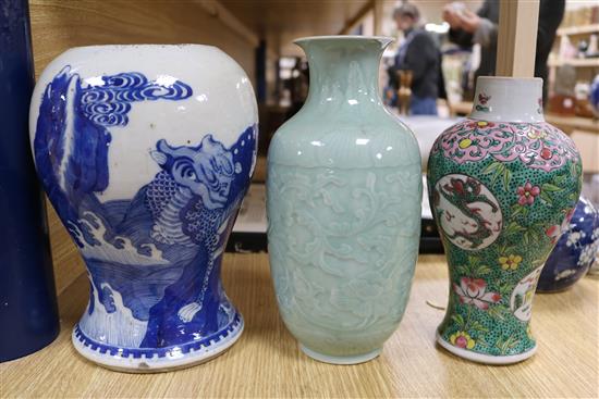 A Chinese blue and white dragon vase, a figure, two jars, teabowl and a famille verte vase